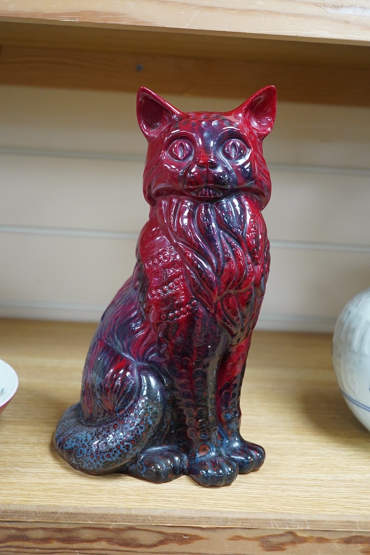 A Doulton Flambé glazed model of a cat, 28cm high